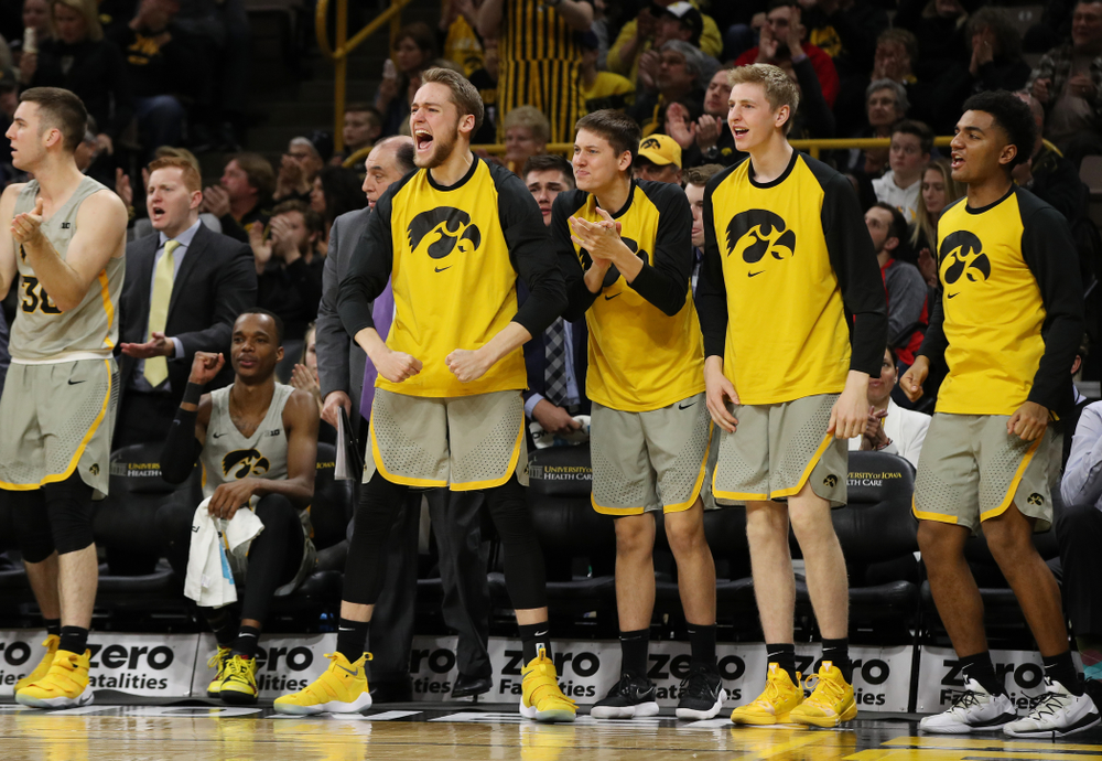 Iowa Hawkeyes forward Riley Till (20), guard Austin Ash (13), and forward Michael Baer (0) against the Nebraska Cornhuskers Sunday, January 6, 2019 at Carver-Hawkeye Arena. (Brian Ray/hawkeyesports.com)
