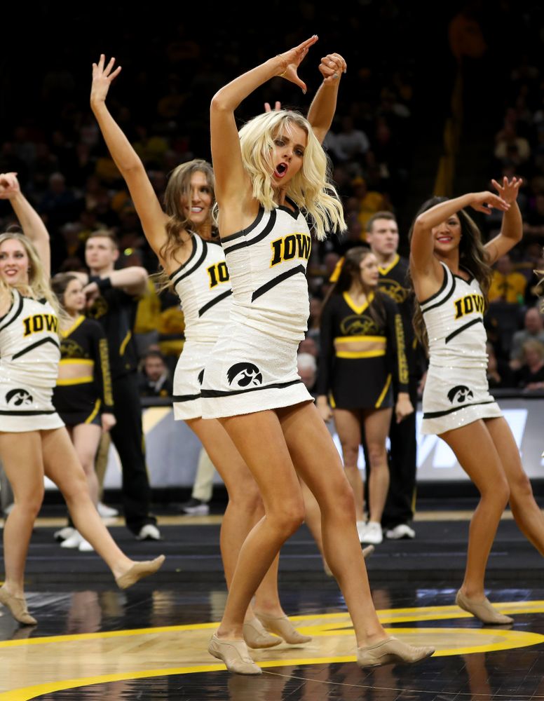 The Iowa Cheerleaders and Dance Team perform on senior night at half-time of the Iowa Hawkeyes game against the Purdue Boilermakers Tuesday, March 3, 2020 at Carver-Hawkeye Arena. (Brian Ray/hawkeyesports.com)