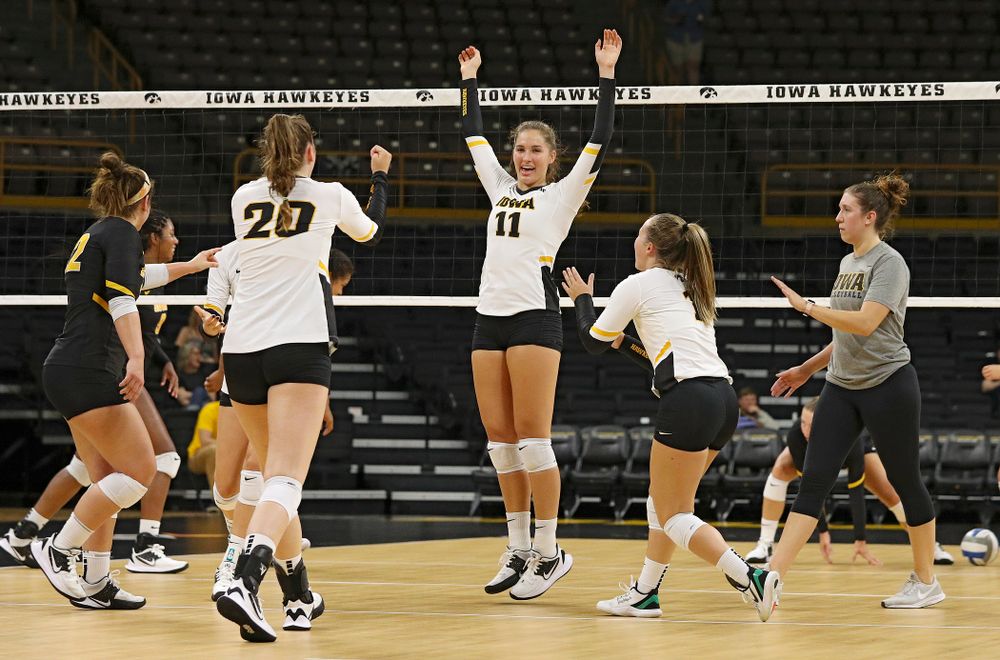 Iowa’s Blythe Rients (11) celebrates with teammates during the second set of the Black and Gold scrimmage at Carver-Hawkeye Arena in Iowa City on Saturday, Aug 24, 2019. (Stephen Mally/hawkeyesports.com)