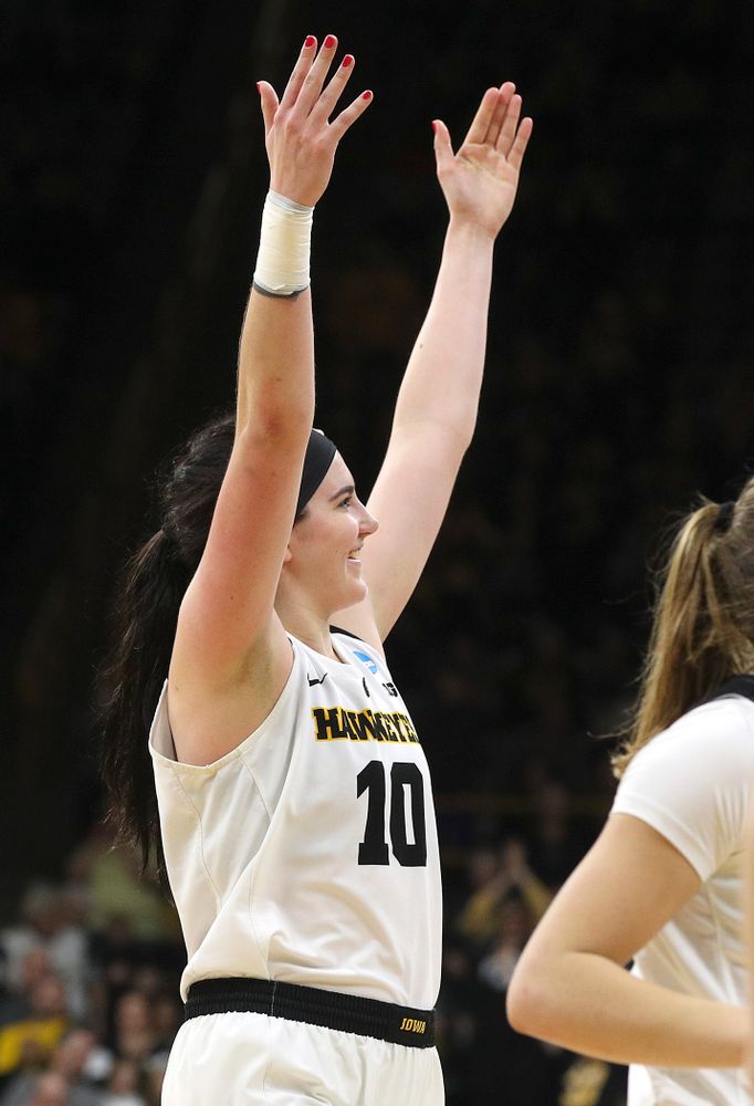 Iowa Hawkeyes center Megan Gustafson (10) pumps up the crowd as she walks back to her bench for a timeout during the fourth quarter of their second round game in the 2019 NCAA Women's Basketball Tournament at Carver Hawkeye Arena in Iowa City on Sunday, Mar. 24, 2019. (Stephen Mally for hawkeyesports.com)