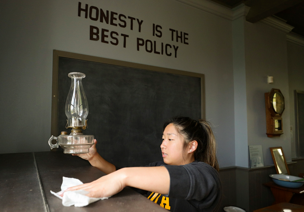 Iowa women's gymnasts clean the 1876 Coralville Schoolhouse during the 21st annual ISAAC Hawkeye Day of Caring in Coralville on Sunday, Apr. 28, 2019. (Stephen Mally/hawkeyesports.com)
