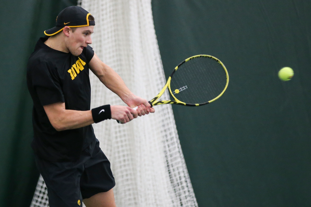 Iowa’s Joe Tyler returns a hit during the Iowa men’s tennis meet vs VCU on Saturday, February 29, 2020 at the Hawkeye Tennis and Recreation Complex. (Lily Smith/hawkeyesports.com)