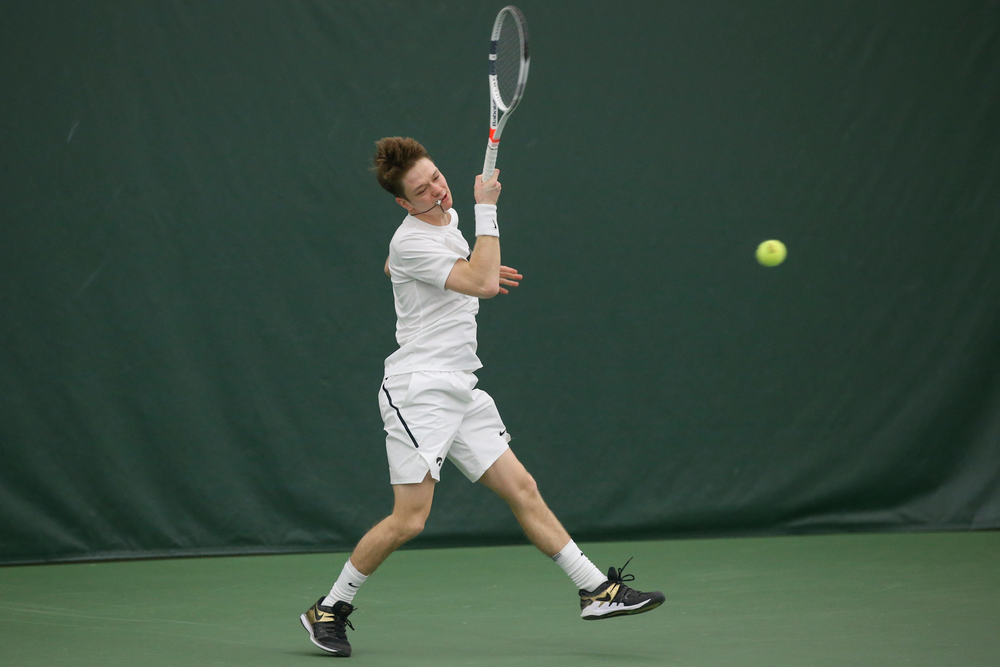 Iowa’s Jason Kerst returns a hit during the Iowa men’s tennis meet vs Nebraska on Sunday, March 1, 2020 at the Hawkeye Tennis and Recreation Complex. (Lily Smith/hawkeyesports.com)