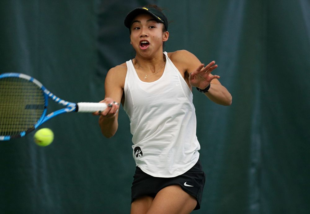 Iowa’s Michelle Bacalla returns a shot during her singles match at the Hawkeye Tennis and Recreation Complex in Iowa City on Sunday, February 23, 2020. (Stephen Mally/hawkeyesports.com)