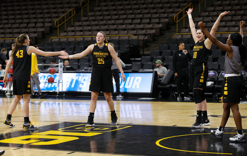 Iowa Hawkeyes forward Amanda Ollinger (43), center Monika Czinano (25), forward Megan Gustafson (10), and guard Tomi Taiwo (1) at a practice during the 2019 NCAA Women's Basketball Tournament at Carver Hawkeye Arena in Iowa City on Saturday, Mar. 23, 2019. (Stephen Mally for hawkeyesports.com)