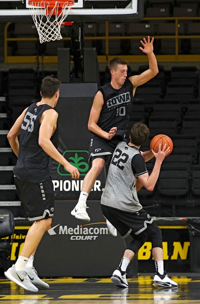 Iowa Hawkeyes guard Joe Wieskamp (10) defends as foward Patrick McCaffery (22) looks to shoot during practice at Carver-Hawkeye Arena in Iowa City on Monday, Sep 30, 2019. (Stephen Mally/hawkeyesports.com)