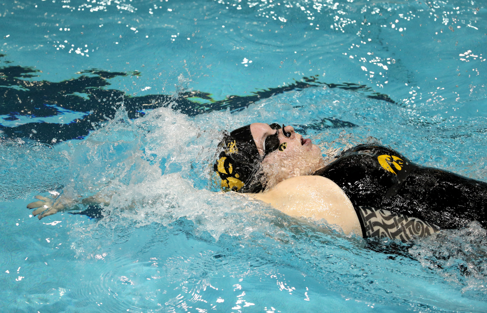 Iowa's Natalie McGovern swims the 100-yard backstroke against the Iowa State Cyclones in the Iowa Corn Cy-Hawk Series Friday, December 7, 2018 at at the Campus Recreation and Wellness Center. (Brian Ray/hawkeyesports.com)
