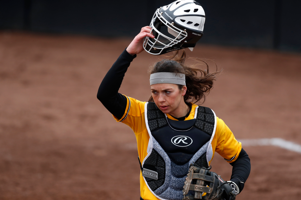 Iowa Hawkeyes catcher Angela Schmiederer (12) against UW Green Bay Tuesday, March 27, 2018 at Bob Pearl Field. (Brian Ray/hawkeyesports.com)