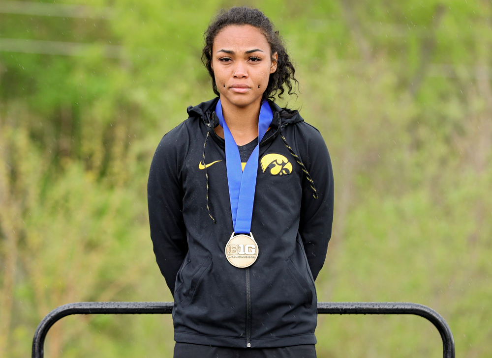 Iowa's Tria Simmons on the award stand after placing third in the heptathlon event on the second day of the Big Ten Outdoor Track and Field Championships at Francis X. Cretzmeyer Track in Iowa City on Saturday, May. 11, 2019. (Stephen Mally/hawkeyesports.com)