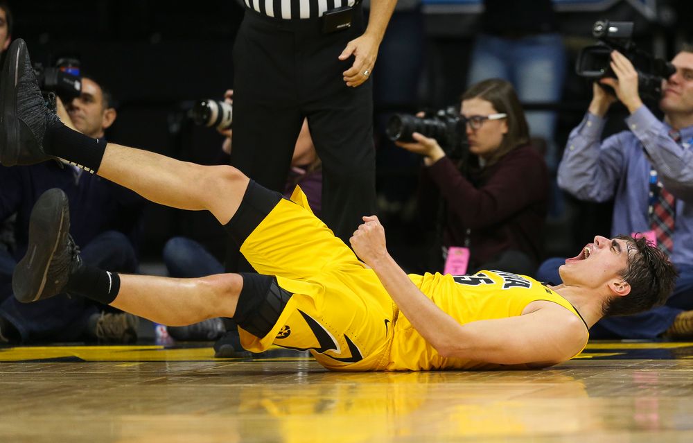 Iowa Hawkeyes forward Luka Garza (55) reacts after making a basket while being fouled against Wisconsin on November 30, 2018 at Carver-Hawkeye Arena. (Tork Mason/hawkeyesports.com)