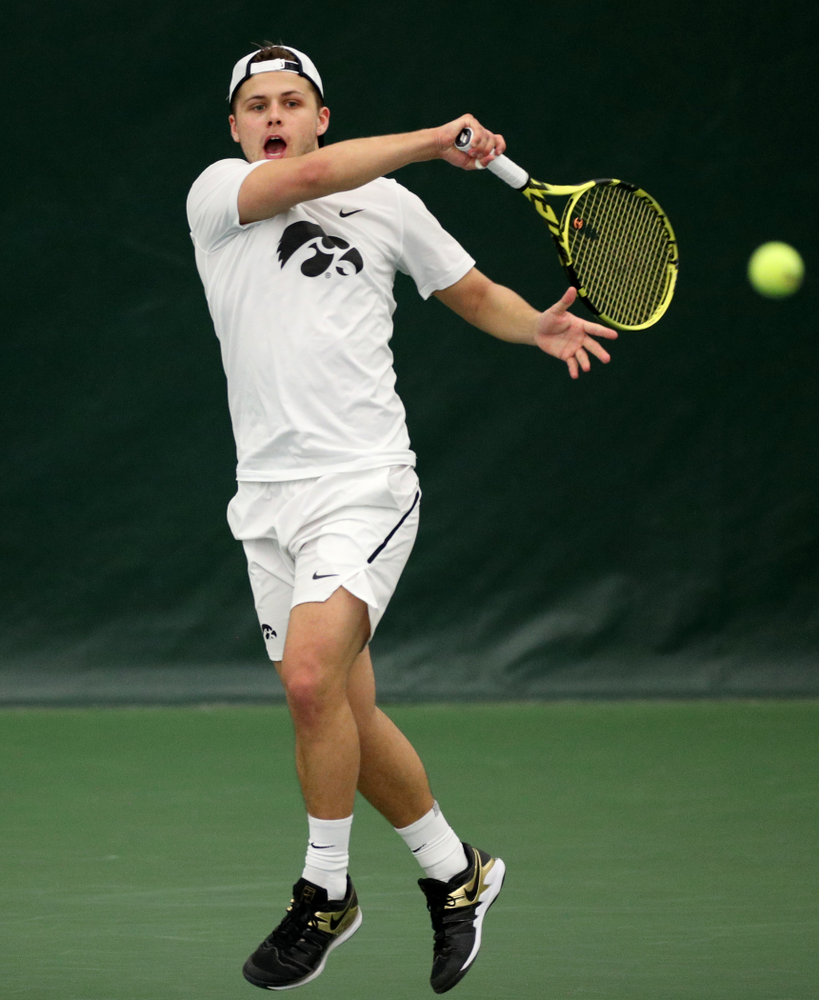 Iowa’s Will Davies against Cornell Sunday, March 8, 2020 at the Hawkeye Tennis and Recreation Center. (Brian Ray/hawkeyesports.com)