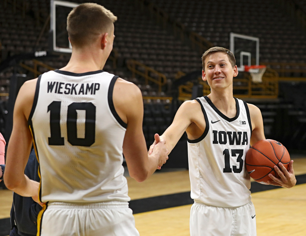 Iowa Hawkeyes guard Joe Wieskamp (10) and guard Austin Ash (13) during Iowa Men’s Basketball Media Day at Carver-Hawkeye Arena in Iowa City on Wednesday, Oct 9, 2019. (Stephen Mally/hawkeyesports.com)