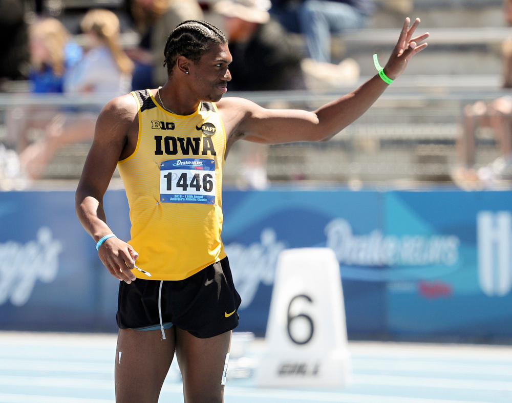 Iowa's Anthony Williams waves after running the men's 110 meter hurdles event during the second day of the Drake Relays at Drake Stadium in Des Moines on Friday, Apr. 26, 2019. (Stephen Mally/hawkeyesports.com)