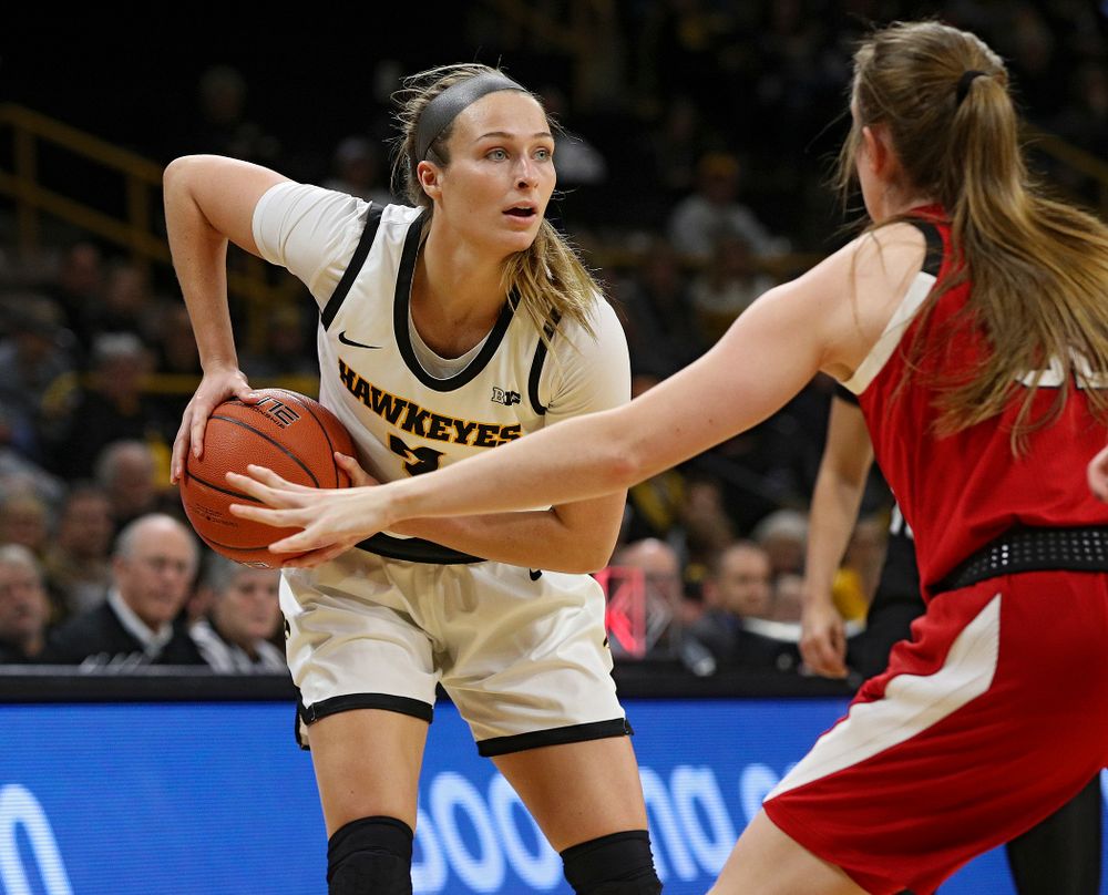 Iowa Hawkeyes guard Makenzie Meyer (3) looks to pass during the first quarter of the game at Carver-Hawkeye Arena in Iowa City on Thursday, February 6, 2020. (Stephen Mally/hawkeyesports.com)