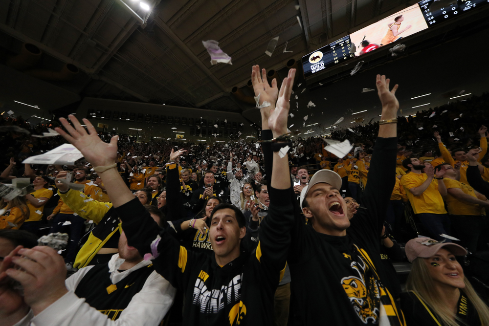 The Hawks Nest throws paper in the air after the Iowa Hawkeyes first basket against the Nebraska Cornhuskers Saturday, February 8, 2020 at Carver-Hawkeye Arena. (Brian Ray/hawkeyesports.com)