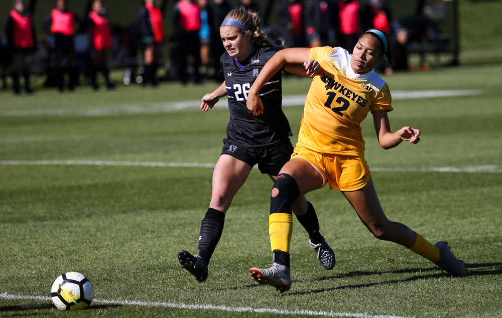 Iowa Hawkeyes forward Olivia Fiegel (12) chases down the ball during a game against Northwestern at the Iowa Soccer Complex on October 21, 2018. (Tork Mason/hawkeyesports.com)