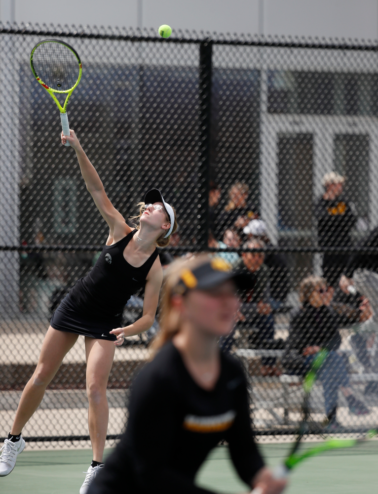 Montana Crawford and Danielle Burich play a doubles match against the Wisconsin Badgers Sunday, April 22, 2018 at the Hawkeye Tennis and Recreation Center. (Brian Ray/hawkeyesports.com)
