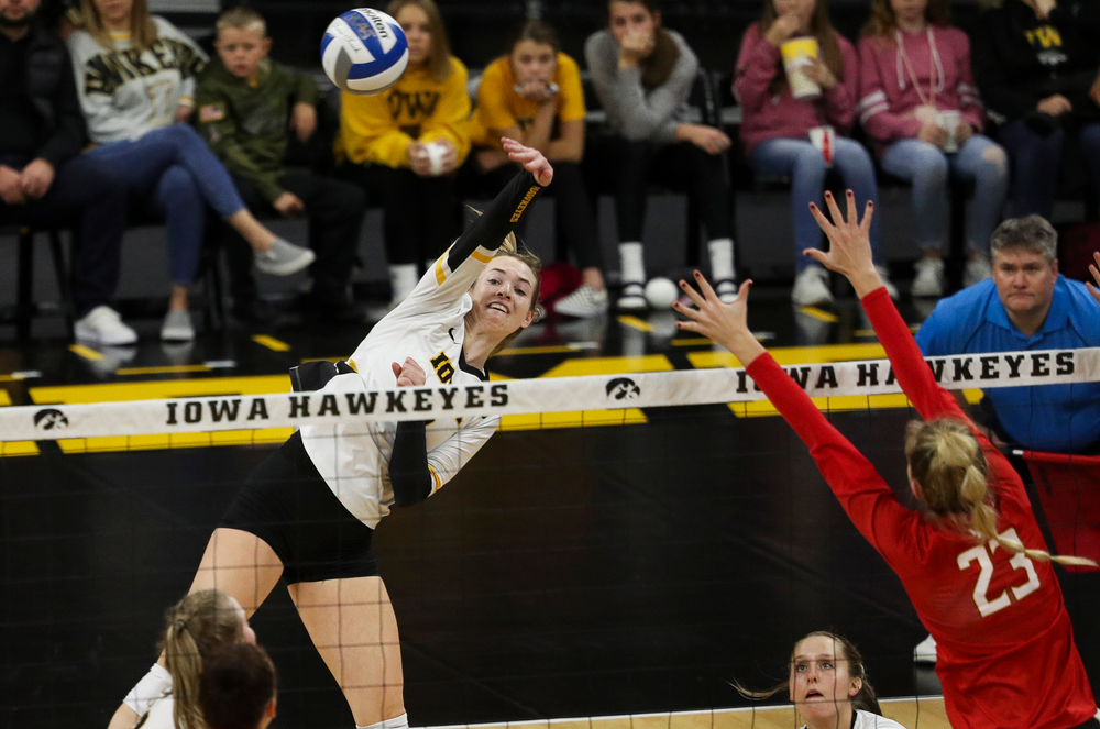 Iowa Hawkeyes outside hitter Meghan Buzzerio (5) spikes the ball during a match against Maryland at Carver-Hawkeye Arena on November 23, 2018. (Tork Mason/hawkeyesports.com)