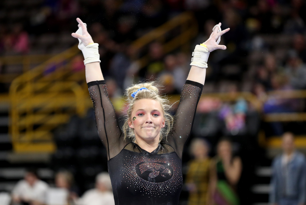 Iowa’s Elinor Rogers competes on the bars against Michigan Friday, February 14, 2020 at Carver-Hawkeye Arena. (Brian Ray/hawkeyesports.com)