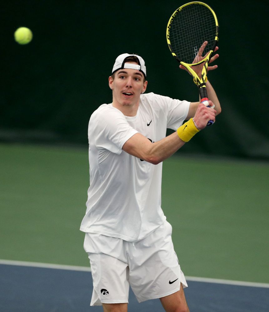 Iowa’s Nikita Snezhko against Cornell Sunday, March 8, 2020 at the Hawkeye Tennis and Recreation Center. (Brian Ray/hawkeyesports.com)
