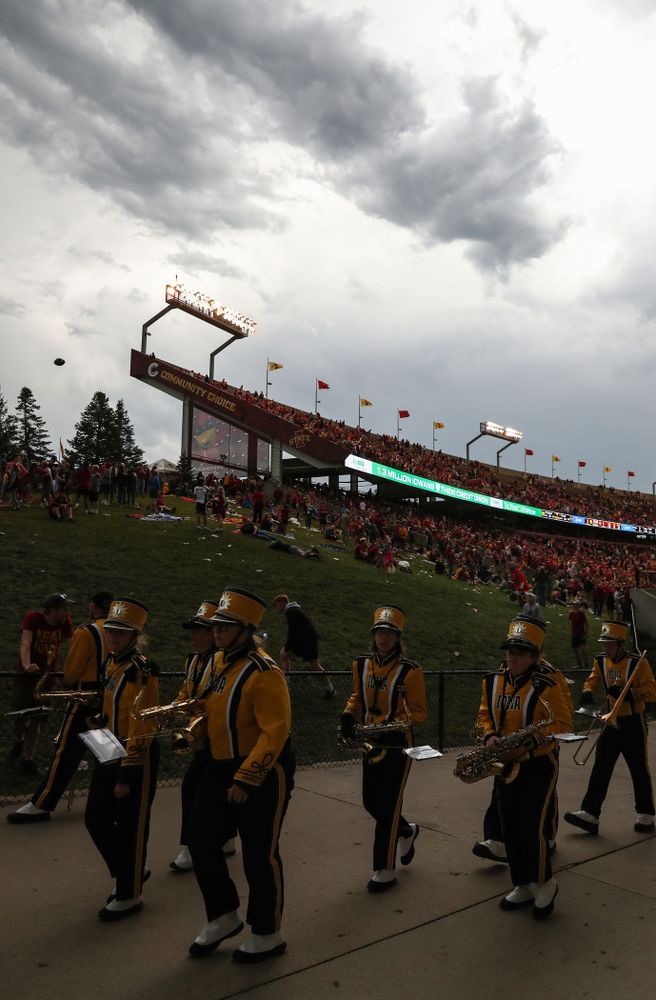 The Hawkeye Marching Band evacuates the field during a weather delay against the Iowa State Cyclones Saturday, September 14, 2019 at Jack Trice Stadium in Ames, Iowa. (Brian Ray/hawkeyesports.com)