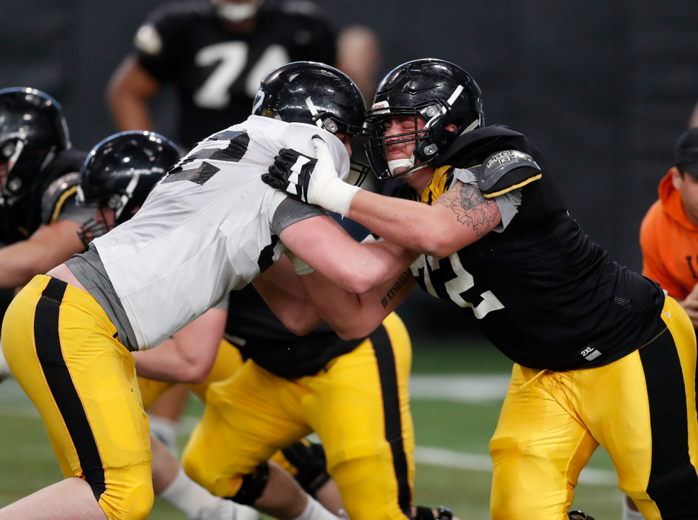 Iowa Hawkeyes offensive lineman Coy Kirkpatrick (72) and Iowa Hawkeyes defensive end Jack Kallenberger (82) during spring practice Wednesday, March 28, 2018 at the Hansen Football Performance Center. (Brian Ray/hawkeyesports.com)