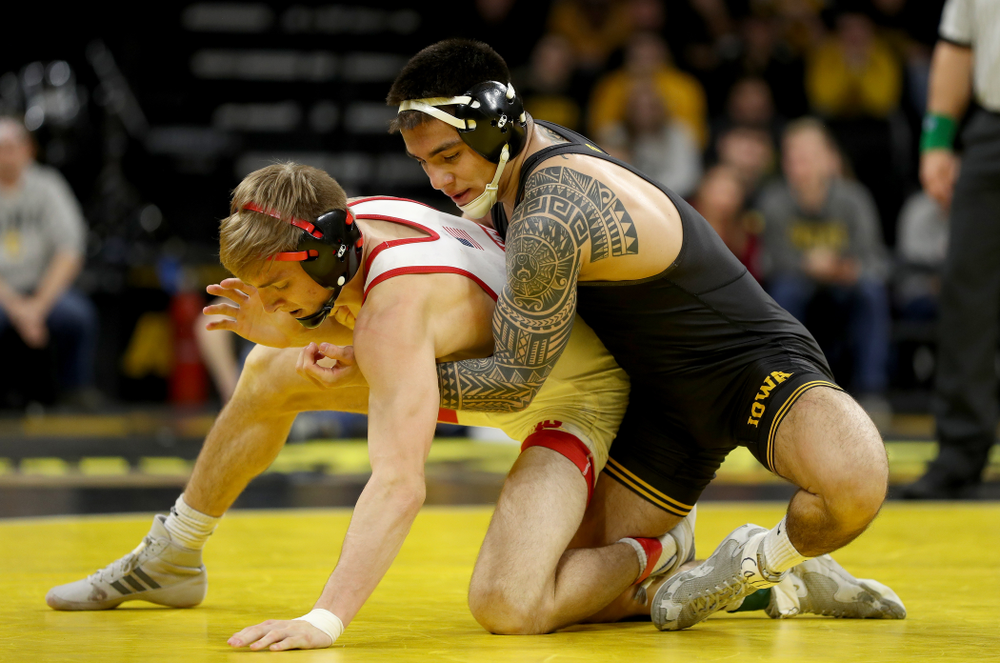 Iowa’s Pat Lugo wrestles Nebraska’s Collin Purinton at 149 pounds Saturday, January 18, 2020 at Carver-Hawkeye Arena. Lugo won the match 4-1. (Brian Ray/hawkeyesports.com)