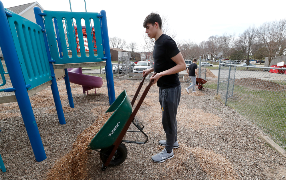 Members of the Iowa Men's Basketball Team volunteer during the Iowa Athletics Department's annual Day of Caring Sunday, April 22, 2018. (Brian Ray/hawkeyesports.com)
