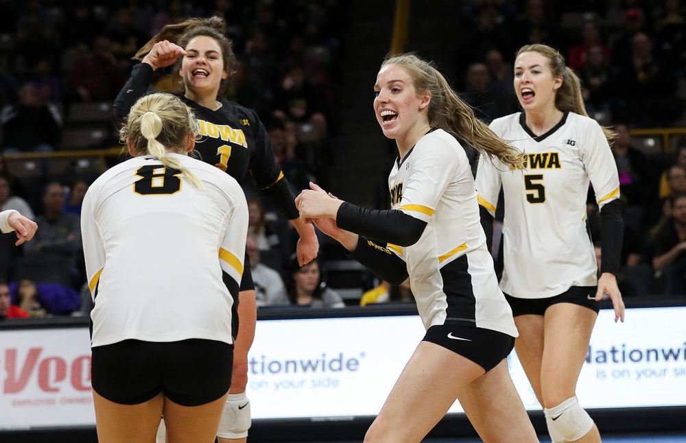 Iowa Hawkeyes middle blocker Hannah Clayton (18) celebrates after winning a point during a match against Maryland at Carver-Hawkeye Arena on November 23, 2018. (Tork Mason/hawkeyesports.com)