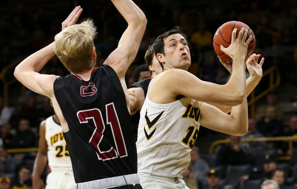 Iowa Hawkeyes forward Ryan Kriener (15) pump fakes during a game against Guilford College at Carver-Hawkeye Arena on November 4, 2018. (Tork Mason/hawkeyesports.com)