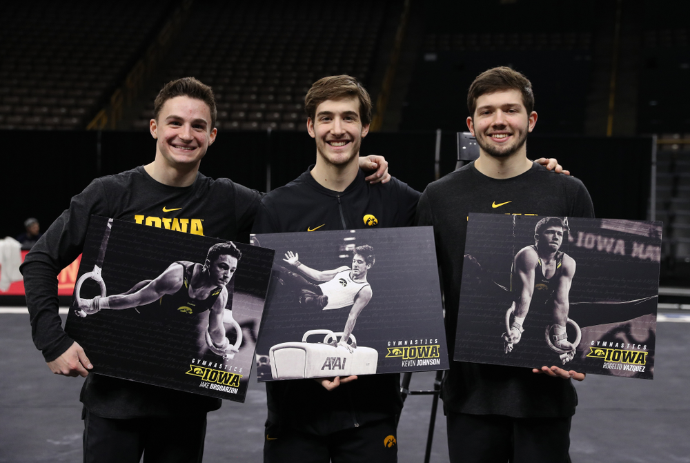 Iowa Men's Gymnastics seniors Jake Brodarzon, Kevin Johnson, and Rogelio Vazquez during senior day ceremonies following their meet against the Ohio State Buckeyes Saturday, March 16, 2019 at Carver-Hawkeye Arena. (Brian Ray/hawkeyesports.com)