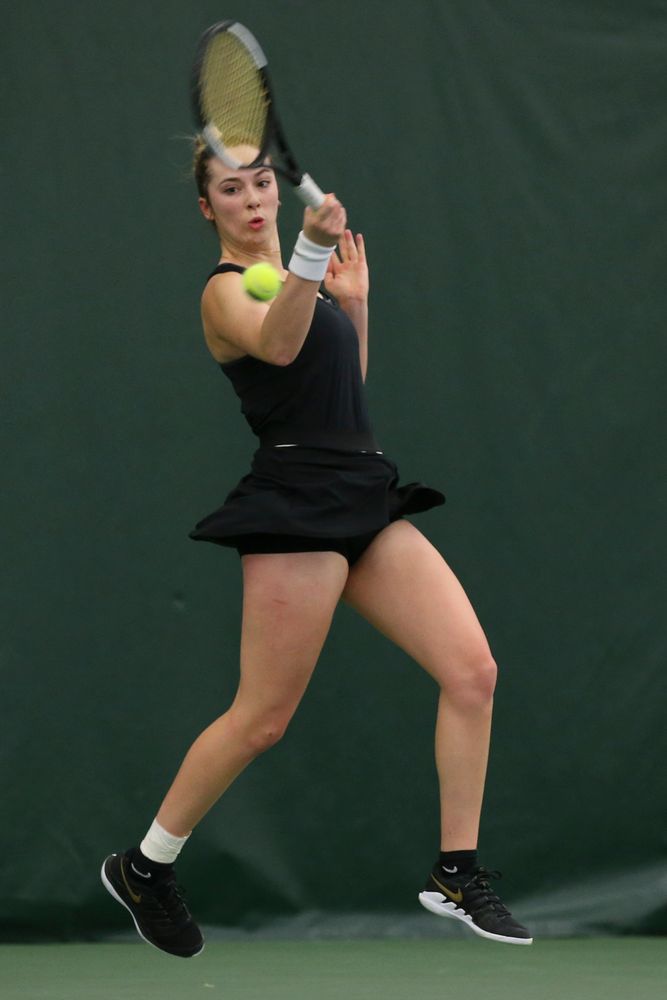 Iowa’s Samantha Mannix returns a hit during the Iowa women’s tennis meet vs UNI on Saturday, February 29, 2020 at the Hawkeye Tennis and Recreation Complex. (Lily Smith/hawkeyesports.com)