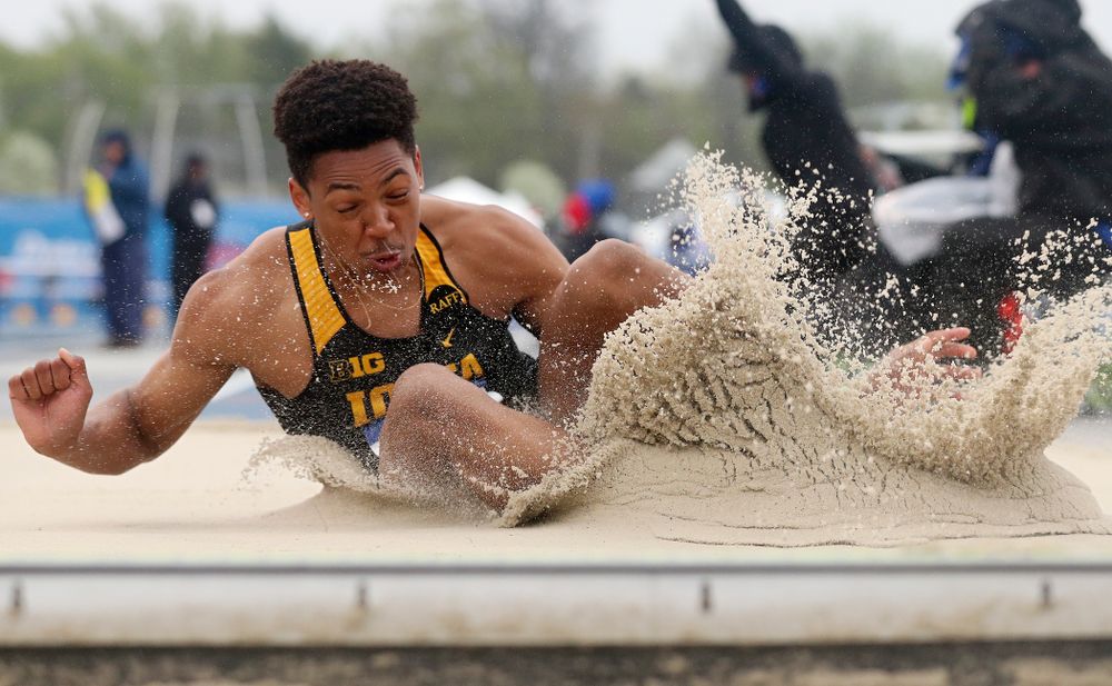 Iowa's James Carter jumps in the men's long jump event during the third day of the Drake Relays at Drake Stadium in Des Moines on Saturday, Apr. 27, 2019. (Stephen Mally/hawkeyesports.com)