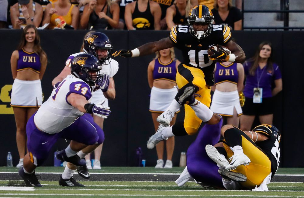 Iowa Hawkeyes running back Mekhi Sargent (10) hurdles a defender during a game against Northern Iowa at Kinnick Stadium on September 15, 2018. (Tork Mason/hawkeyesports.com)