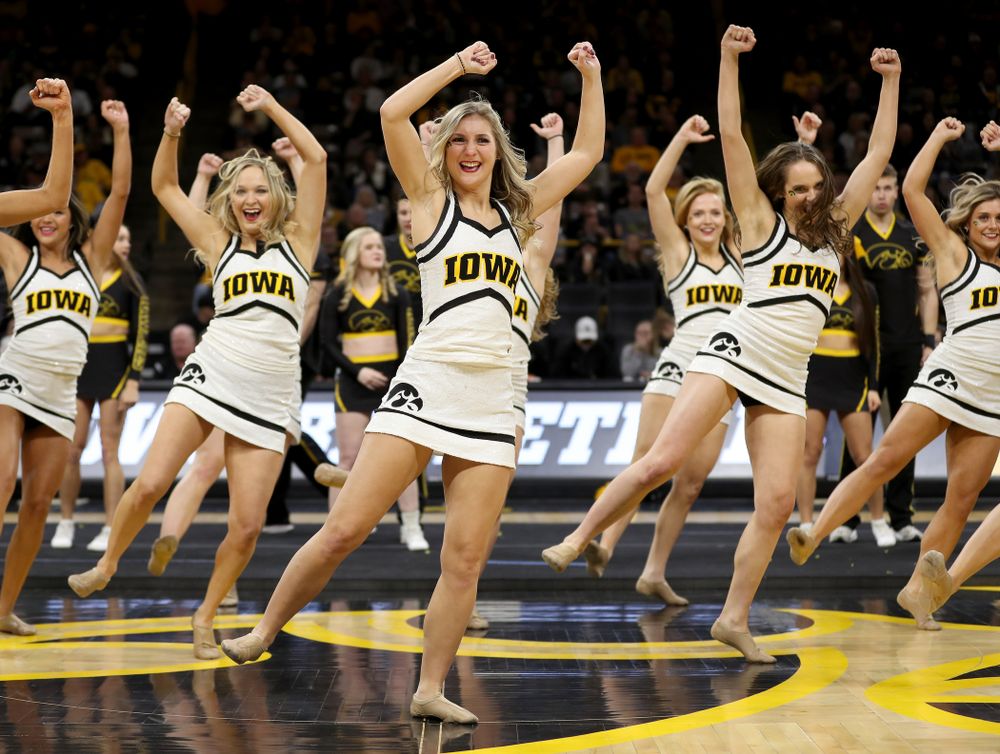 The Iowa Cheerleaders and Dance Team perform on senior night at half-time of the Iowa Hawkeyes game against the Purdue Boilermakers Tuesday, March 3, 2020 at Carver-Hawkeye Arena. (Brian Ray/hawkeyesports.com)