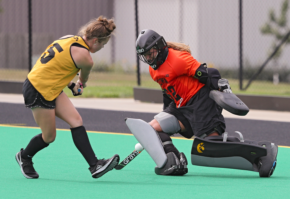 Iowa’s Grace McGuire (62) blocks a shot by Meghan Conroy (5) during practice at Grant Field in Iowa City on Thursday, Aug 15, 2019. (Stephen Mally/hawkeyesports.com)
