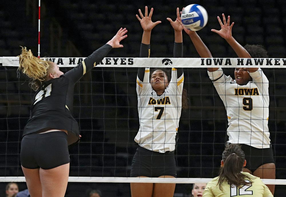 Iowa’s Brie Orr (7) and Amiya Jones (9) get up for a block during the third set of their Big Ten/Pac-12 Challenge match against Colorado at Carver-Hawkeye Arena in Iowa City on Friday, Sep 6, 2019. (Stephen Mally/hawkeyesports.com)