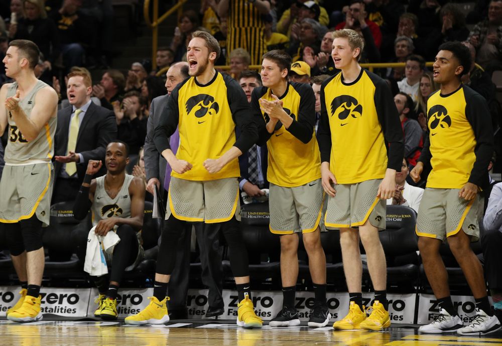 Iowa Hawkeyes forward Riley Till (20), guard Austin Ash (13), and forward Michael Baer (0) against the Nebraska Cornhuskers Sunday, January 6, 2019 at Carver-Hawkeye Arena. (Brian Ray/hawkeyesports.com)