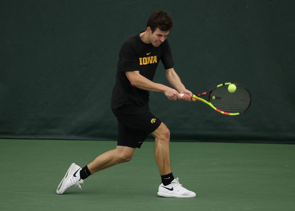 Iowa's Piotr Smietana against UMKC Friday, February 15, 2019 at the Hawkeye Tennis and Recreation Complex. (Brian Ray/hawkeyesports.com)