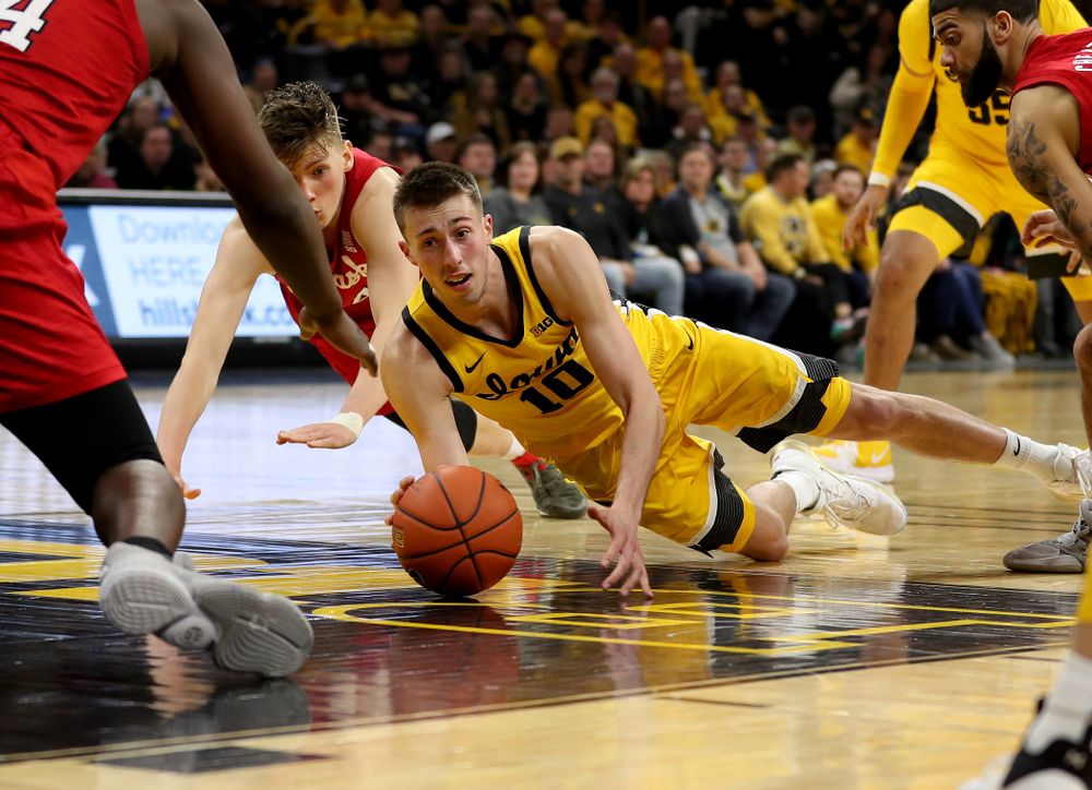 Iowa Hawkeyes guard Joe Wieskamp (10) dives for a loose ball against the Nebraska Cornhuskers Saturday, February 8, 2020 at Carver-Hawkeye Arena. (Brian Ray/hawkeyesports.com)