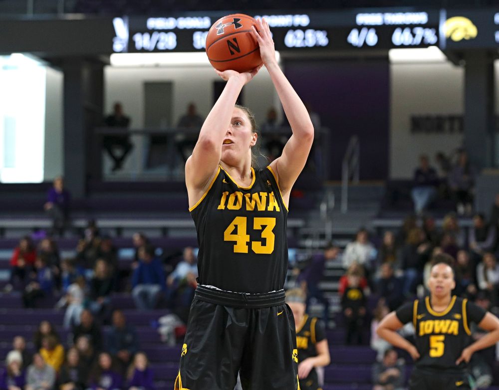 Iowa Hawkeyes forward Amanda Ollinger (43) makes a free throw during the third quarter of their game at Welsh-Ryan Arena in Evanston, Ill. on Sunday, January 5, 2020. (Stephen Mally/hawkeyesports.com)