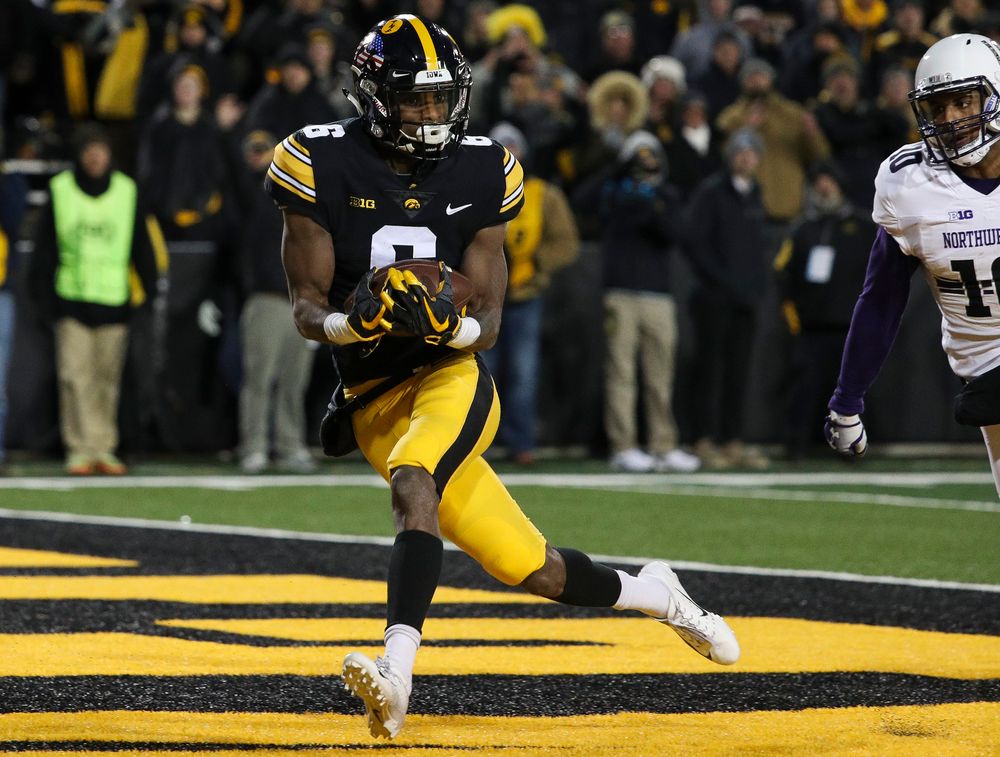 Iowa Hawkeyes wide receiver Ihmir Smith-Marsette (6) makes a touchdown reception during a game against Northwestern at Kinnick Stadium on November 10, 2018. (Tork Mason/hawkeyesports.com)