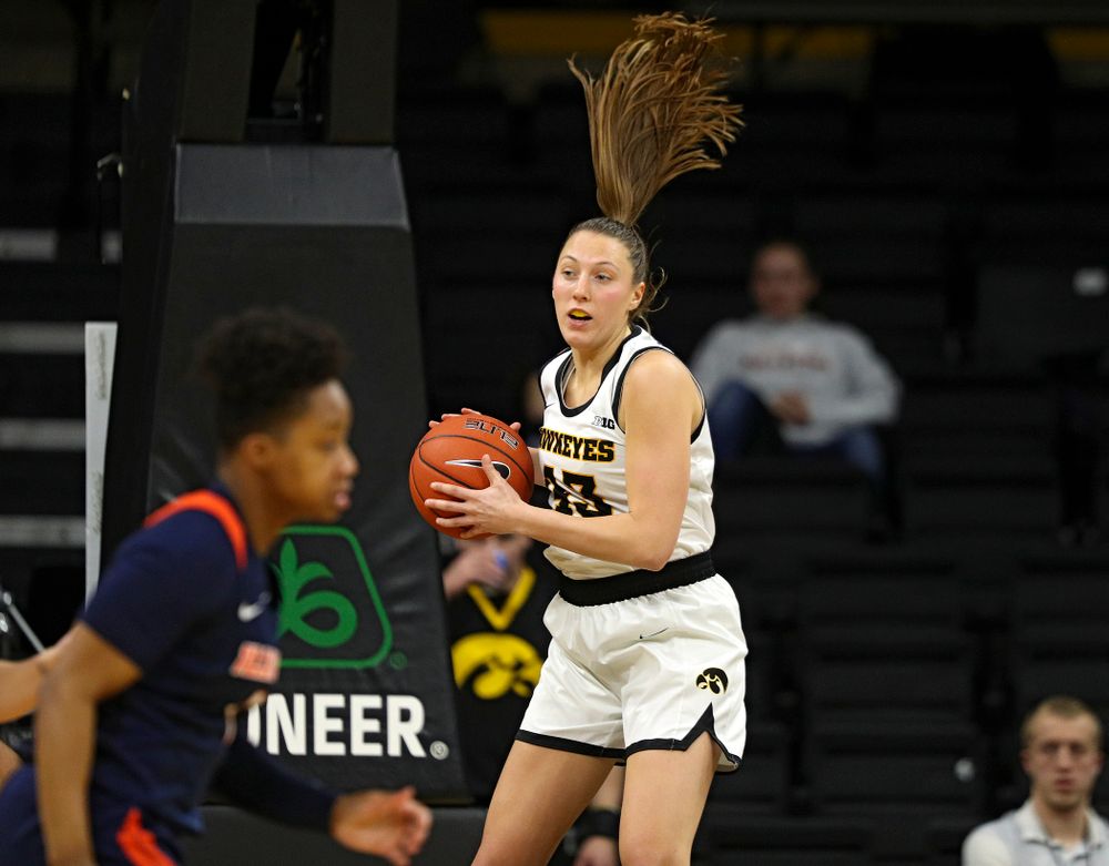 Iowa Hawkeyes forward Amanda Ollinger (43) pulls down a rebound during the third quarter of their game at Carver-Hawkeye Arena in Iowa City on Tuesday, December 31, 2019. (Stephen Mally/hawkeyesports.com)