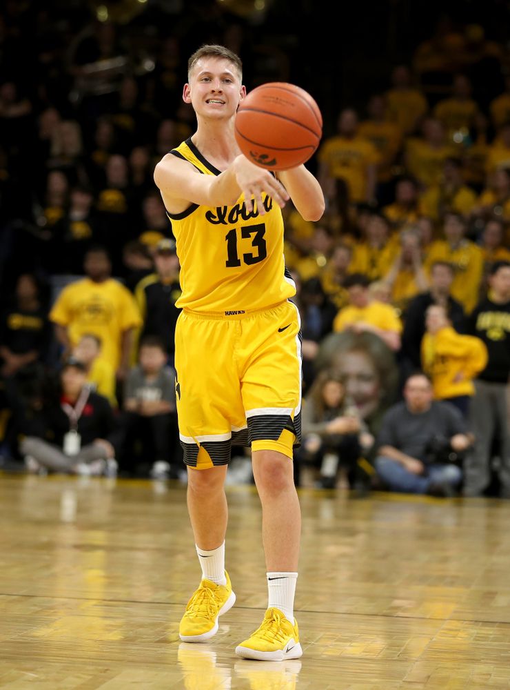 Iowa Hawkeyes guard Austin Ash (13) against the Nebraska Cornhuskers Saturday, February 8, 2020 at Carver-Hawkeye Arena. (Brian Ray/hawkeyesports.com)