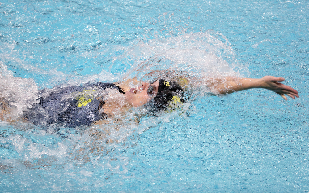 IowaÕs Kennedy Gilbertson competes in the 100 yard backstroke against Notre Dame and Illinois Saturday, January 11, 2020 at the Campus Recreation and Wellness Center. (Brian Ray/hawkeyesports.com)