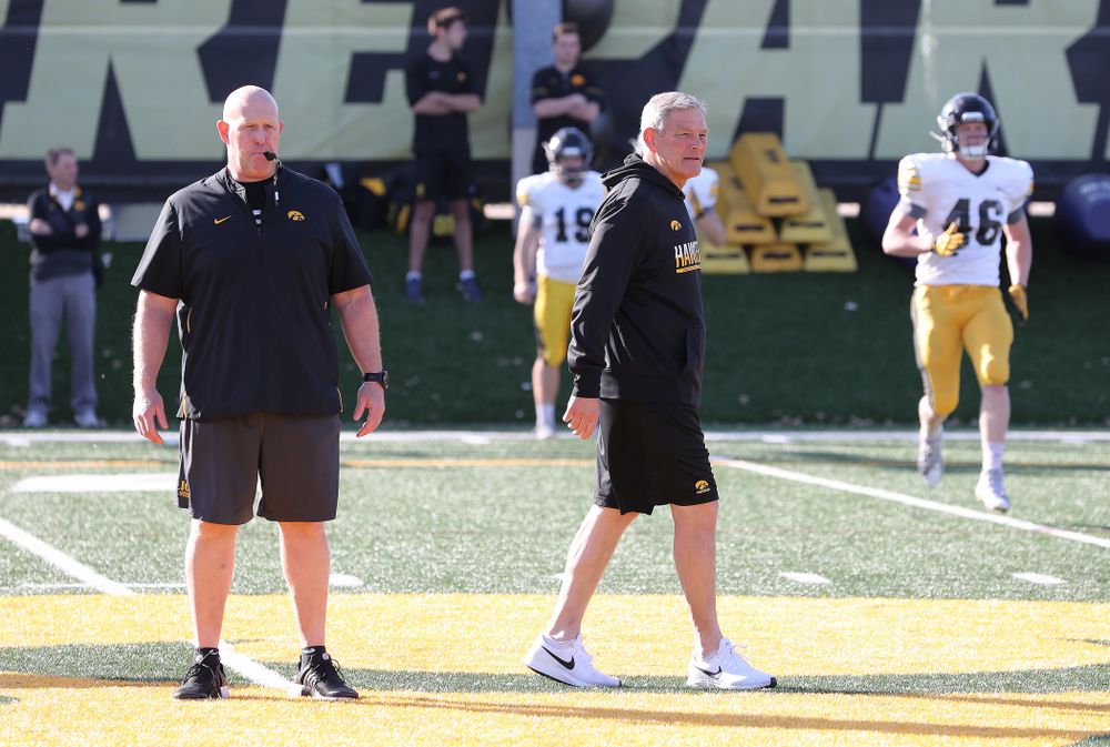 Iowa Hawkeyes head coach Kirk Ferentz and strength and conditioning coordinator Chris Doyle during the teamÕs final spring practice Friday, April 26, 2019 at the Kenyon Football Practice Facility. (Brian Ray/hawkeyesports.com)