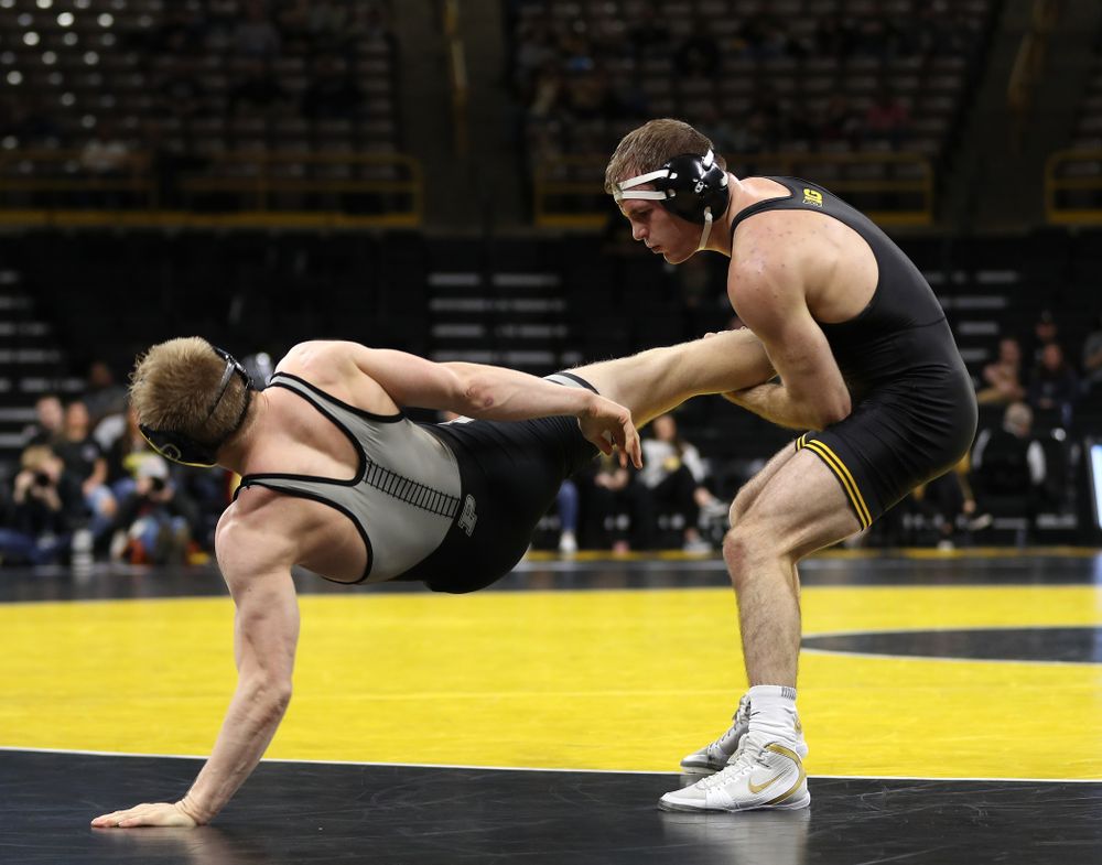 Iowa's Carter Happel wrestles Purdue's Parker Filius at 149 pounds Saturday, November 24, 2018 at Carver-Hawkeye Arena. (Brian Ray/hawkeyesports.com)