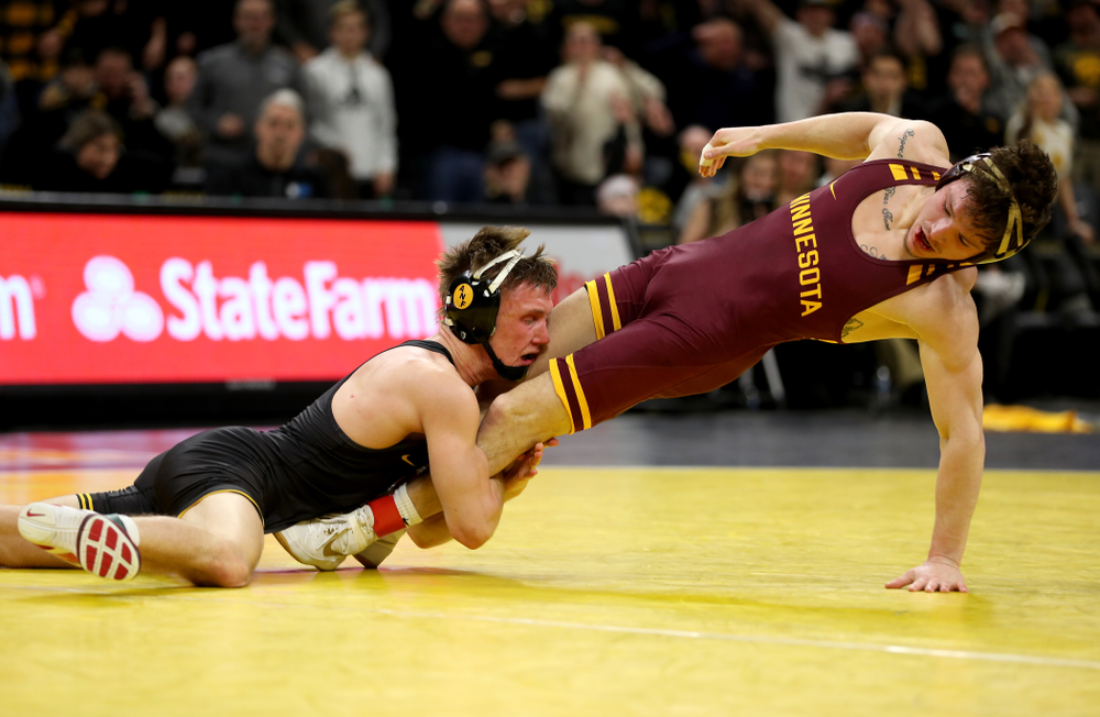 Iowa’s Max Murin wrestles Minnesota’s Mitch McKee at 141 pounds Saturday, February 15, 2020 at Carver-Hawkeye Arena. Murin won the match 6-4. (Brian Ray/hawkeyesports.com)