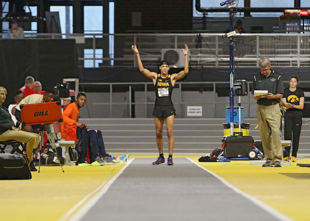 Iowa’s Jamal Britt gets the crowd to clap before his final jump in the men’s long jump event during the Larry Wieczorek Invitational at the Recreation Building in Iowa City on Friday, January 17, 2020. (Stephen Mally/hawkeyesports.com)