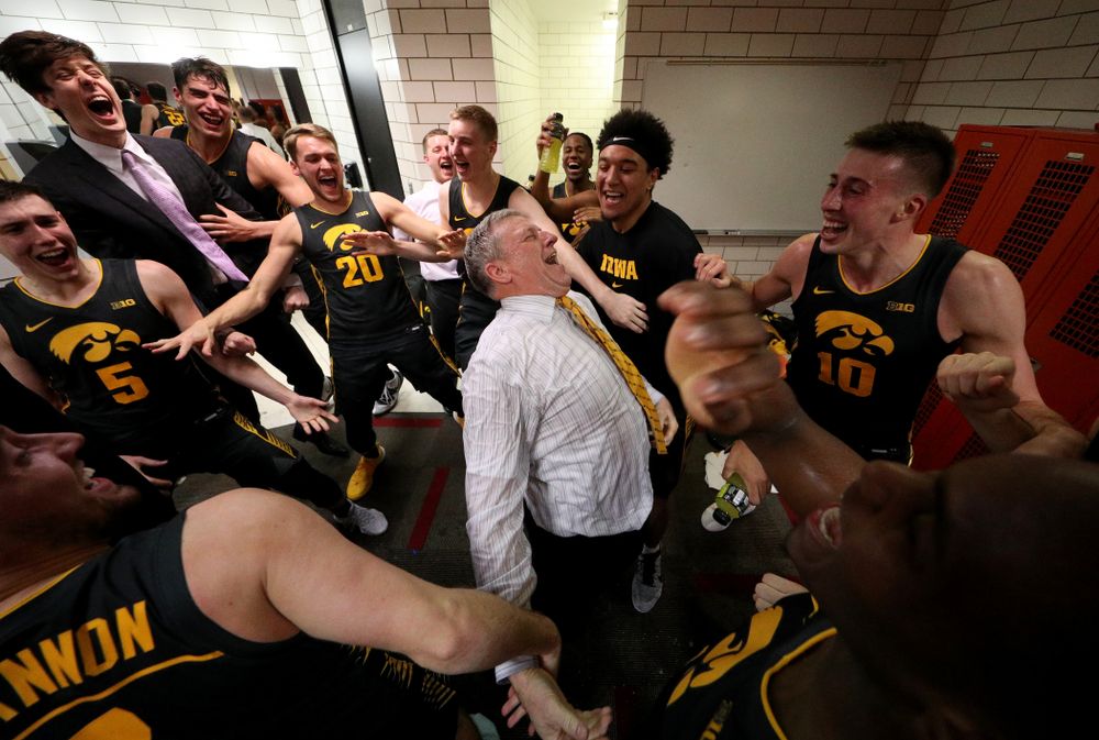 Iowa Hawkeyes assistant coach Kirk Speraw dances with the players as they celebrate their win against the Iowa State Cyclones Thursday, December 12, 2019 at Hilton Coliseum in Ames, Iowa(Brian Ray/hawkeyesports.com)